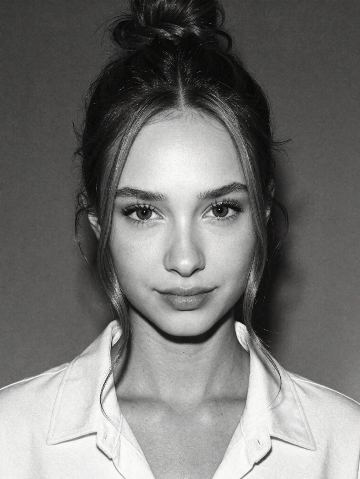 Black and white studio headshot showing model identity consistency
